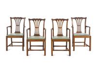 A Set of Four George III Style Walnut Dining Chairs