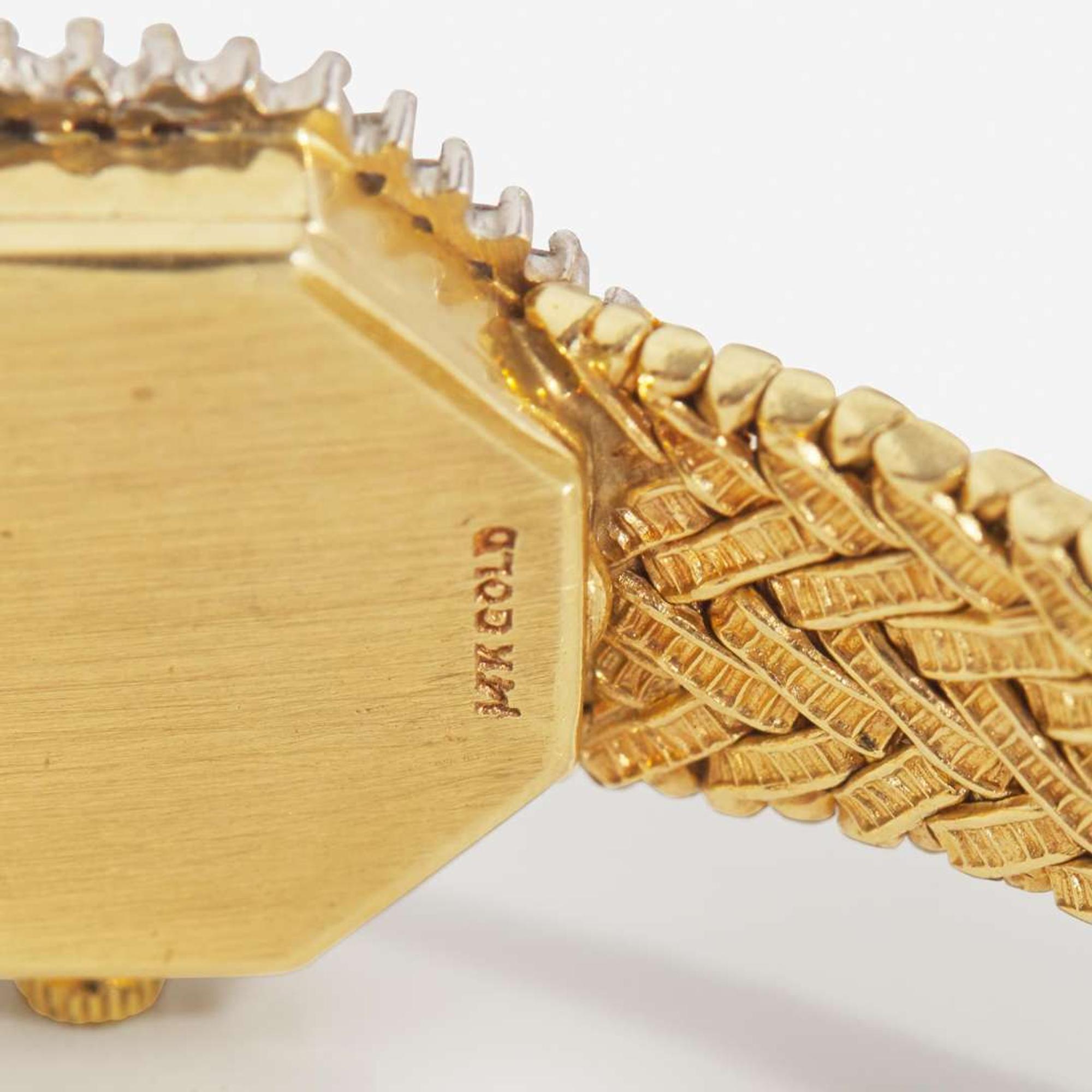 A Ladies 14K Yellow Gold and Diamond Watch