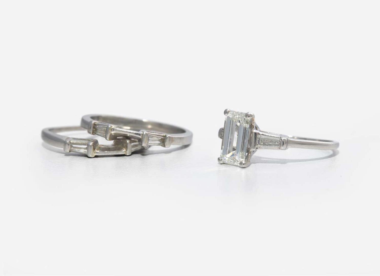 A Platinum and Diamond Ring with Ring Guards, 1.61 Carat Emerald-Cut Diamond, GIA Certified