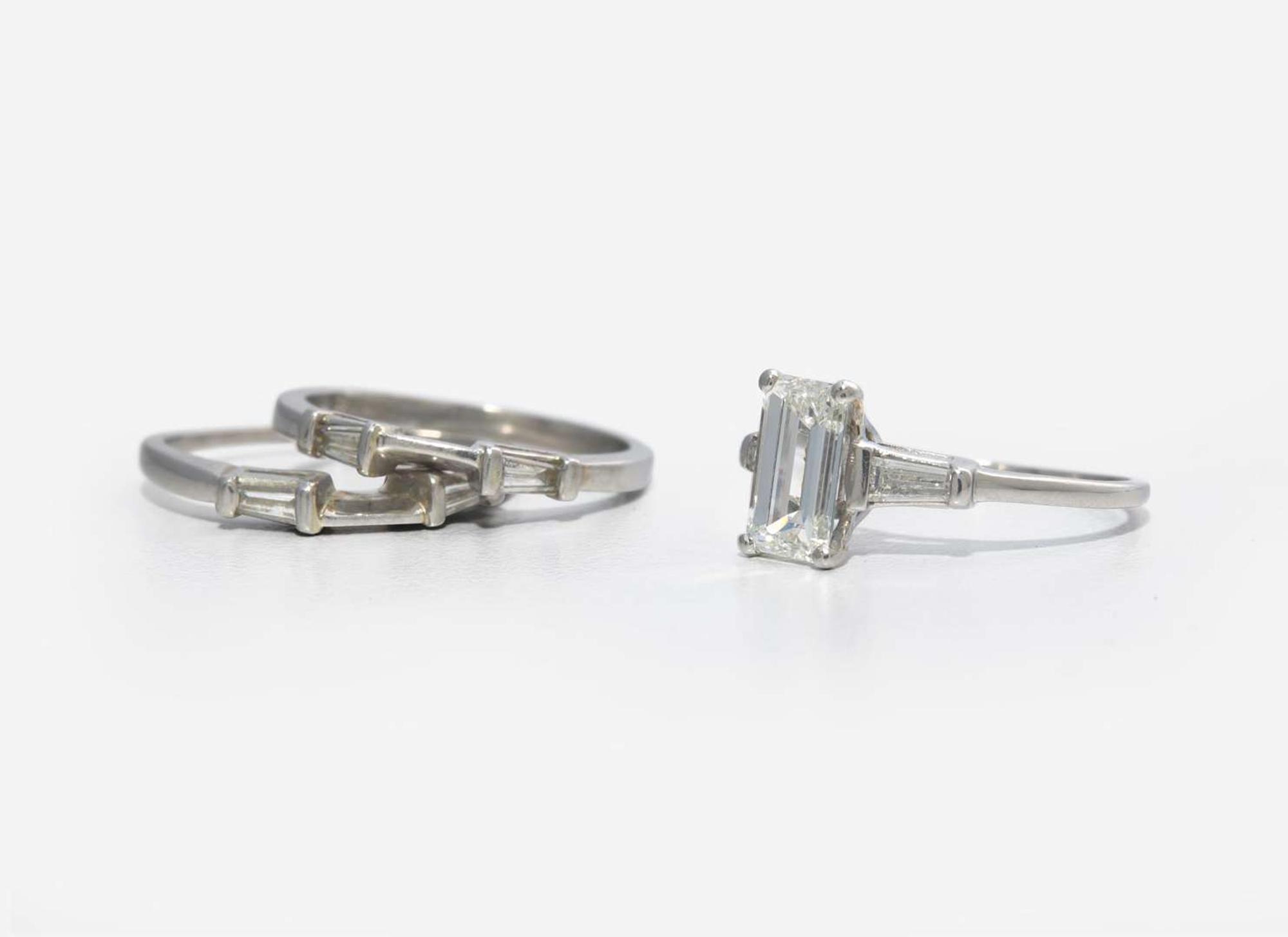 A Platinum and Diamond Ring with Ring Guards, 1.61 Carat Emerald-Cut Diamond, GIA Certified