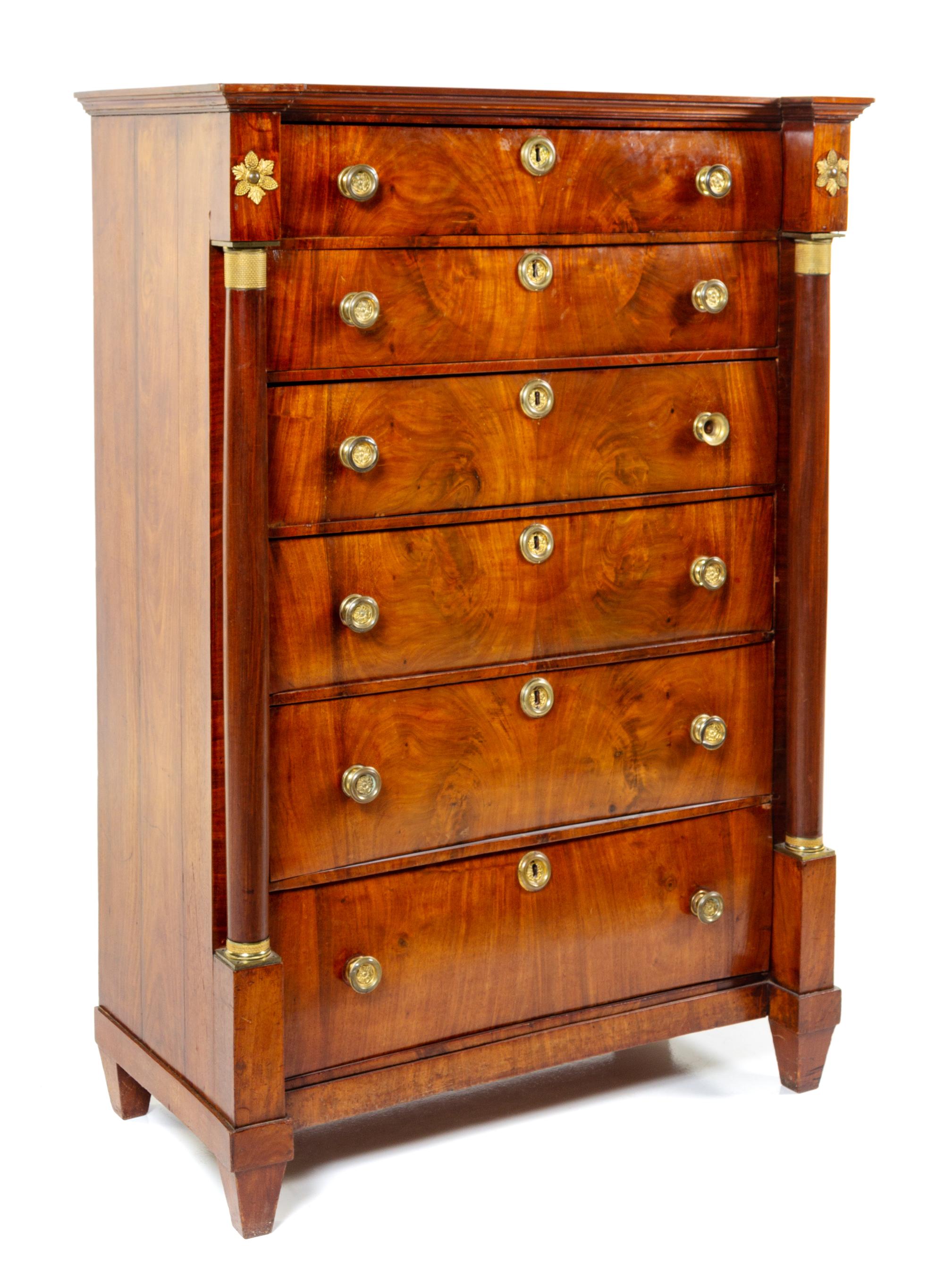 An Empire Style Mahogany Semainier Height 57 x width 39 3/4 x depth 19 inches. — 19TH CENTURY