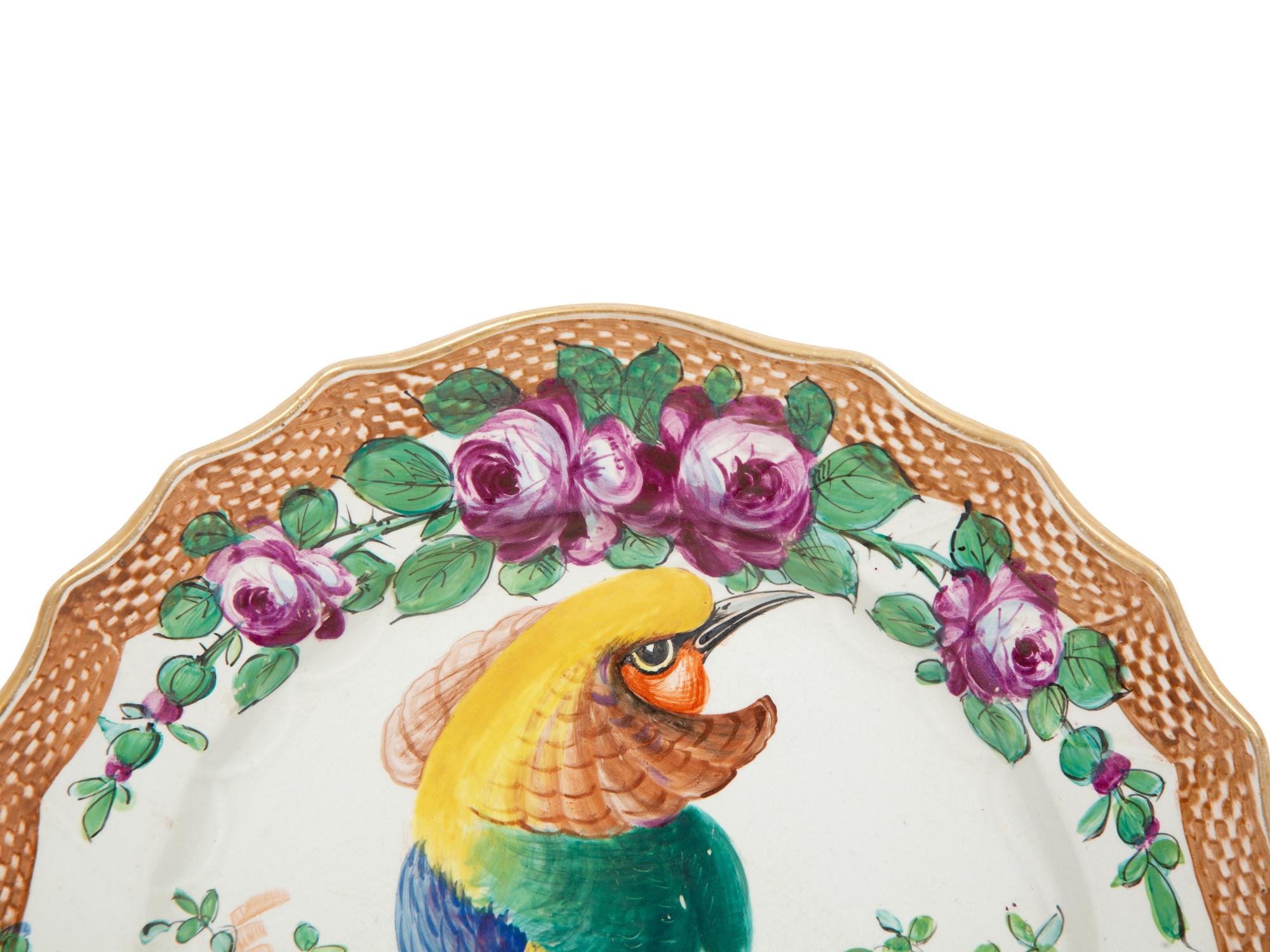 A Pair of Porcelain Plates Painted with Exotic Birds