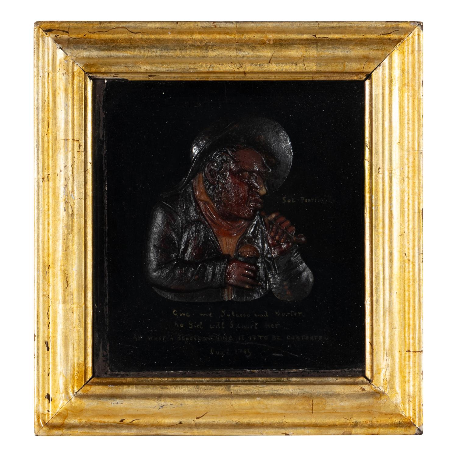 A Pair of Tobacco Themed Wax Portrait Profiles