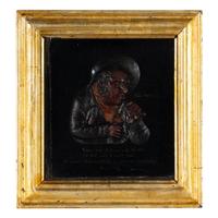 A Pair of Tobacco Themed Wax Portrait Profiles