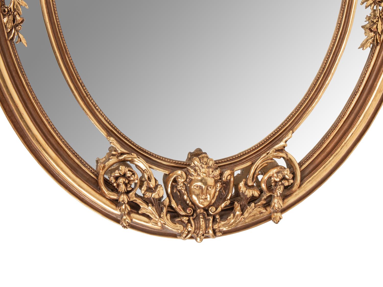 A Napoleon III Style Giltwood and Gilt Composition Mirror