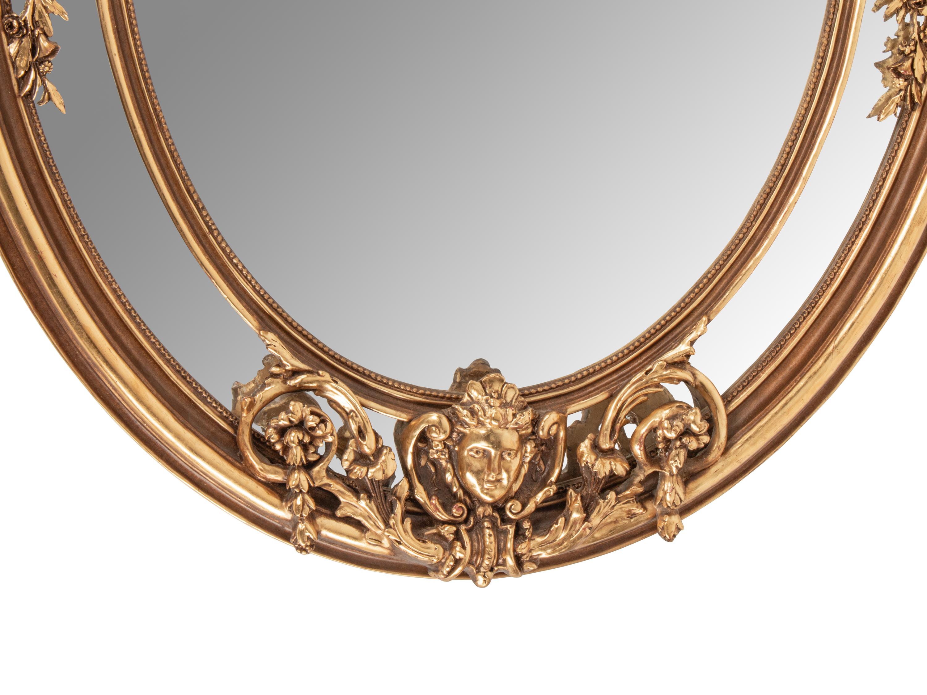 A Napoleon III Style Giltwood and Gilt Composition Mirror