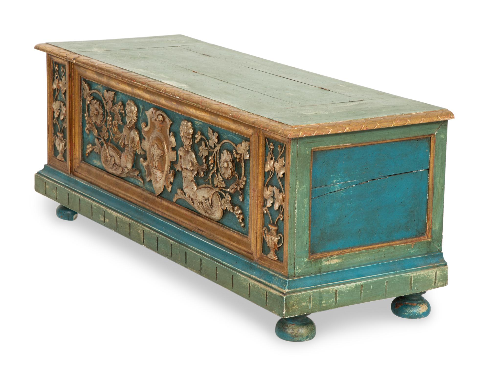 An Italian Parcel Gilt, Silvered and Polychrome Painted Cassone