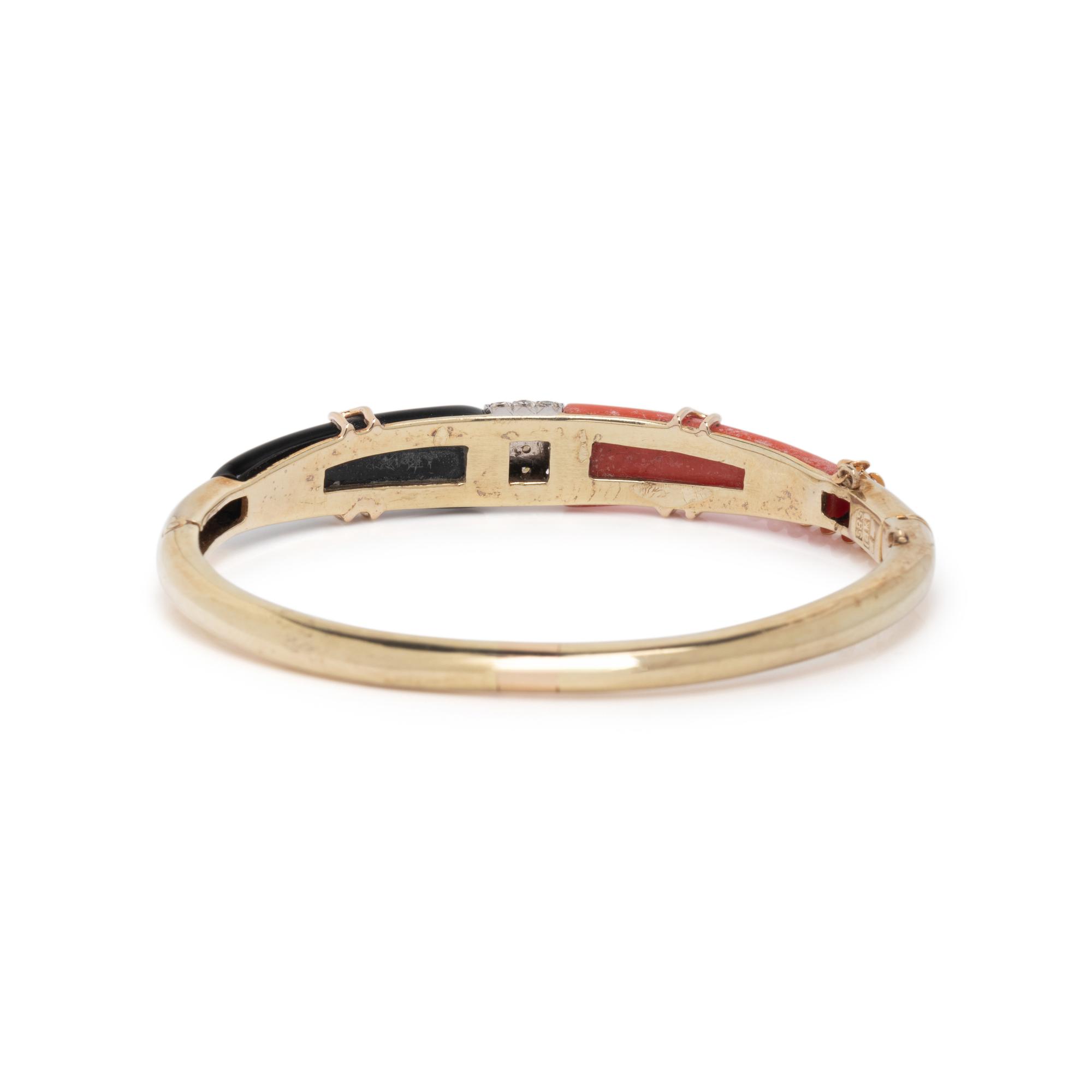 CORAL, ONYX AND DIAMOND BANGLE BRACELET