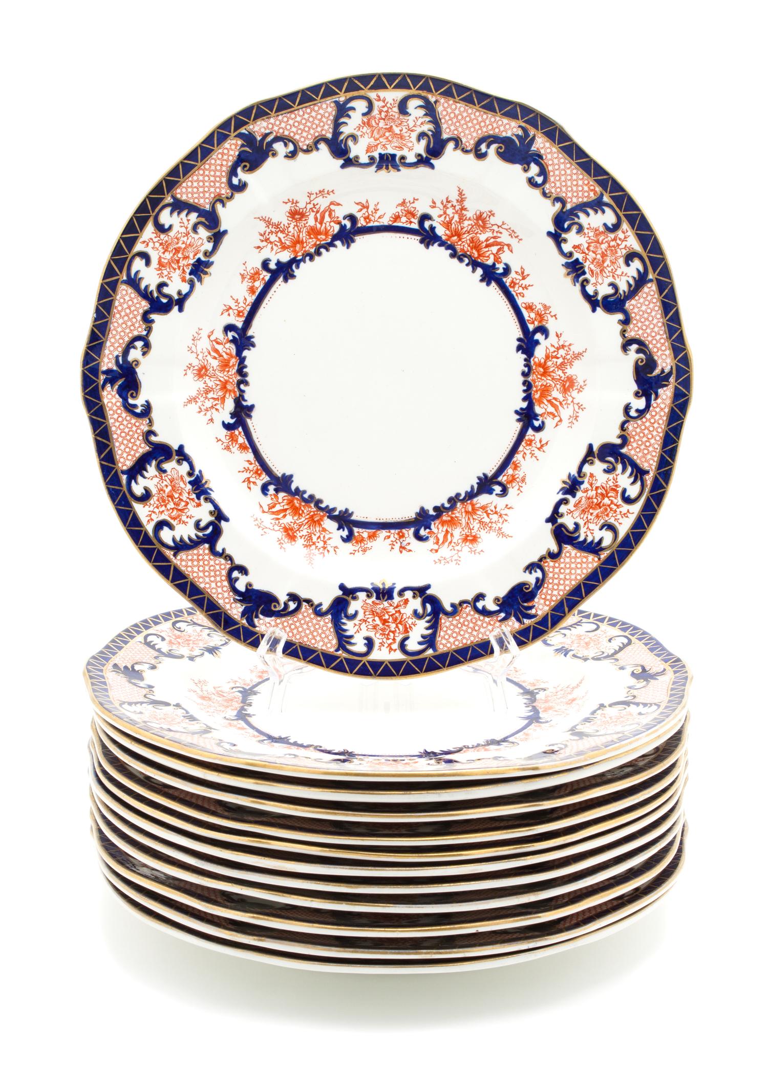 A Set of Twelve Royal Crown Derby Porcelain Plates Diameter 10 1/8 inches.