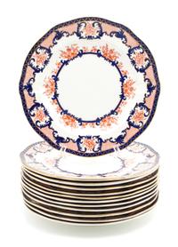 A Set of Twelve Royal Crown Derby Porcelain Plates Diameter 10 1/8 inches.