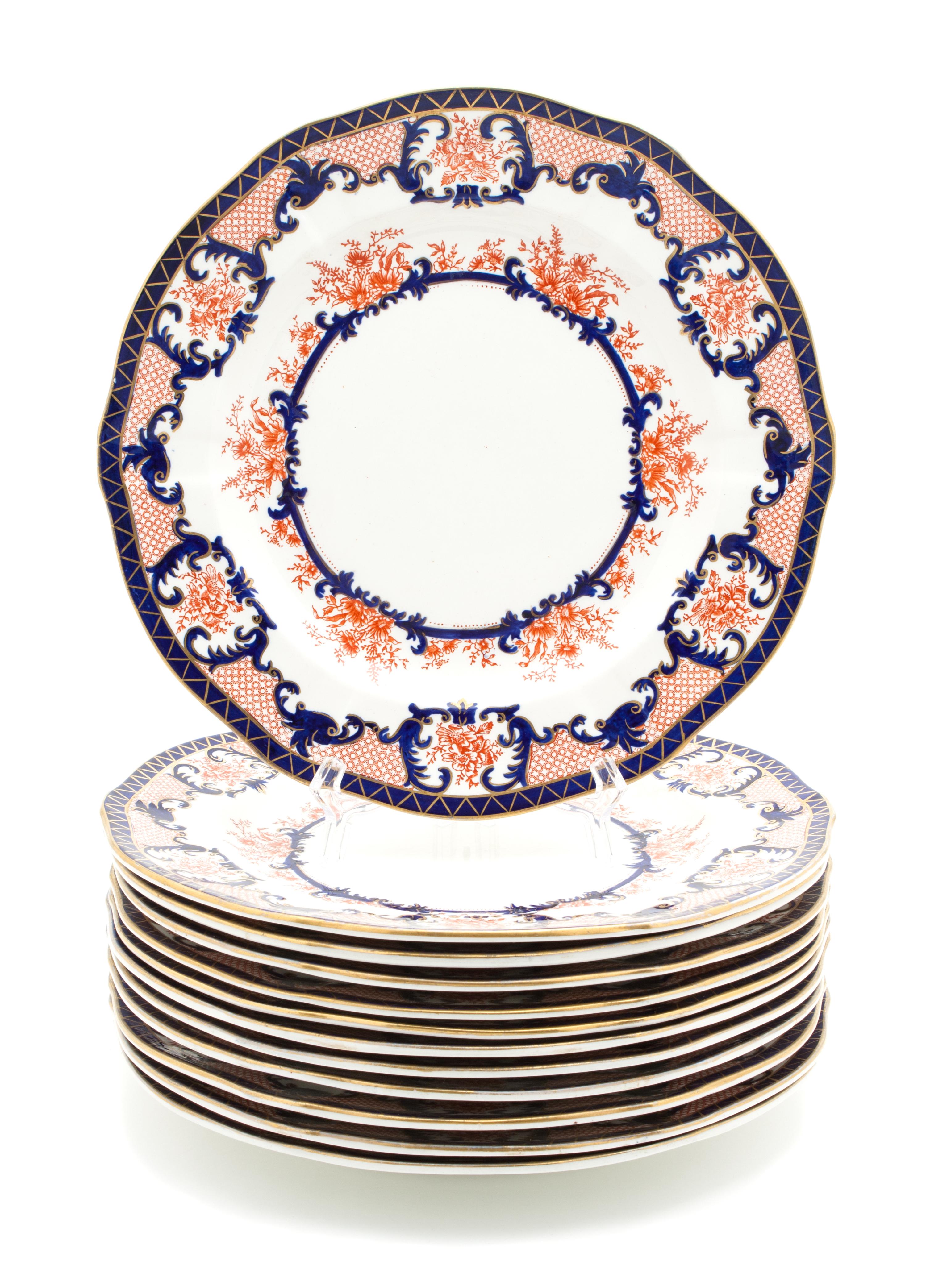 A Set of Twelve Royal Crown Derby Porcelain Plates Diameter 10 1/8 inches.
