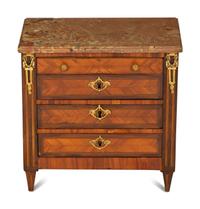 A Louis XVI Diminutive Marble-Top Four Drawer Chiffonier