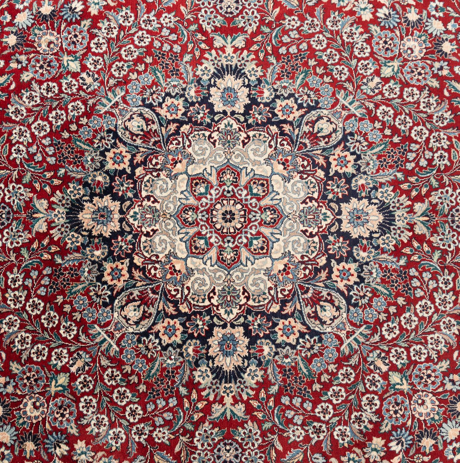 A Qom Wool Rug