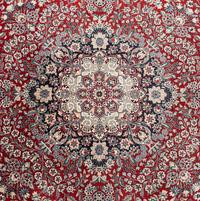 A Qom Wool Rug