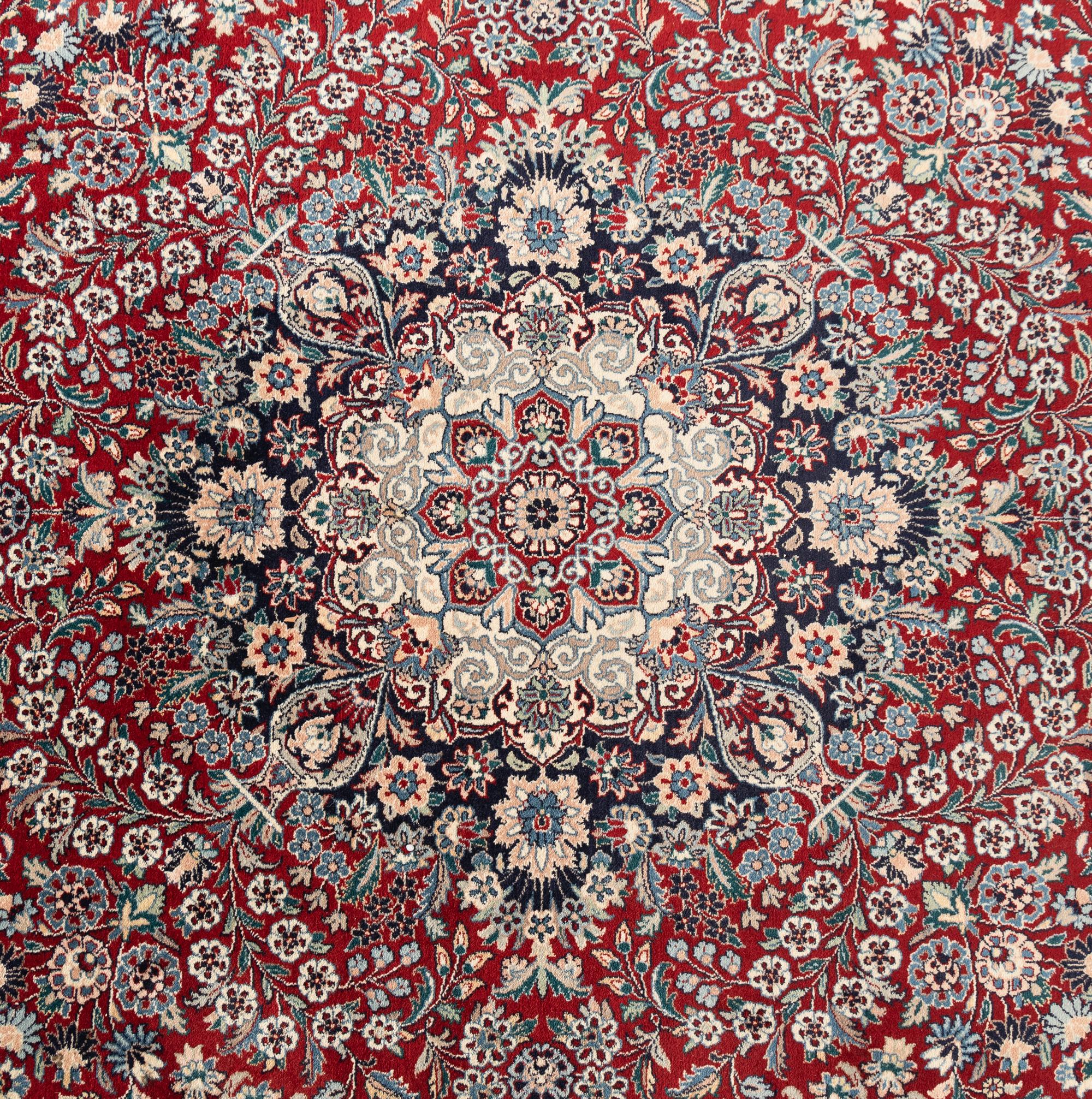 A Qom Wool Rug