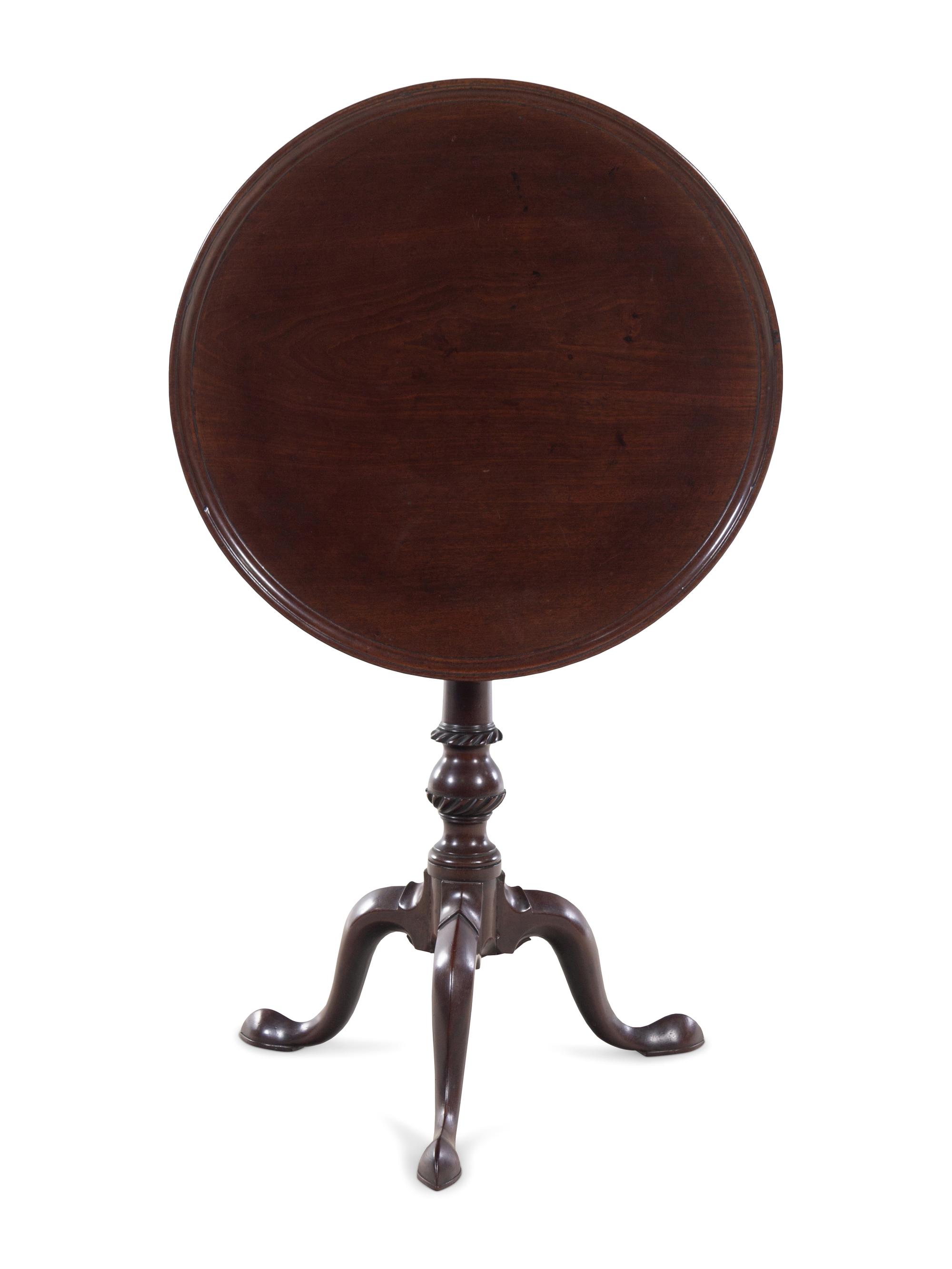 An Irish George III Mahogany Dish-Top Slipper-Foot Candle Stand