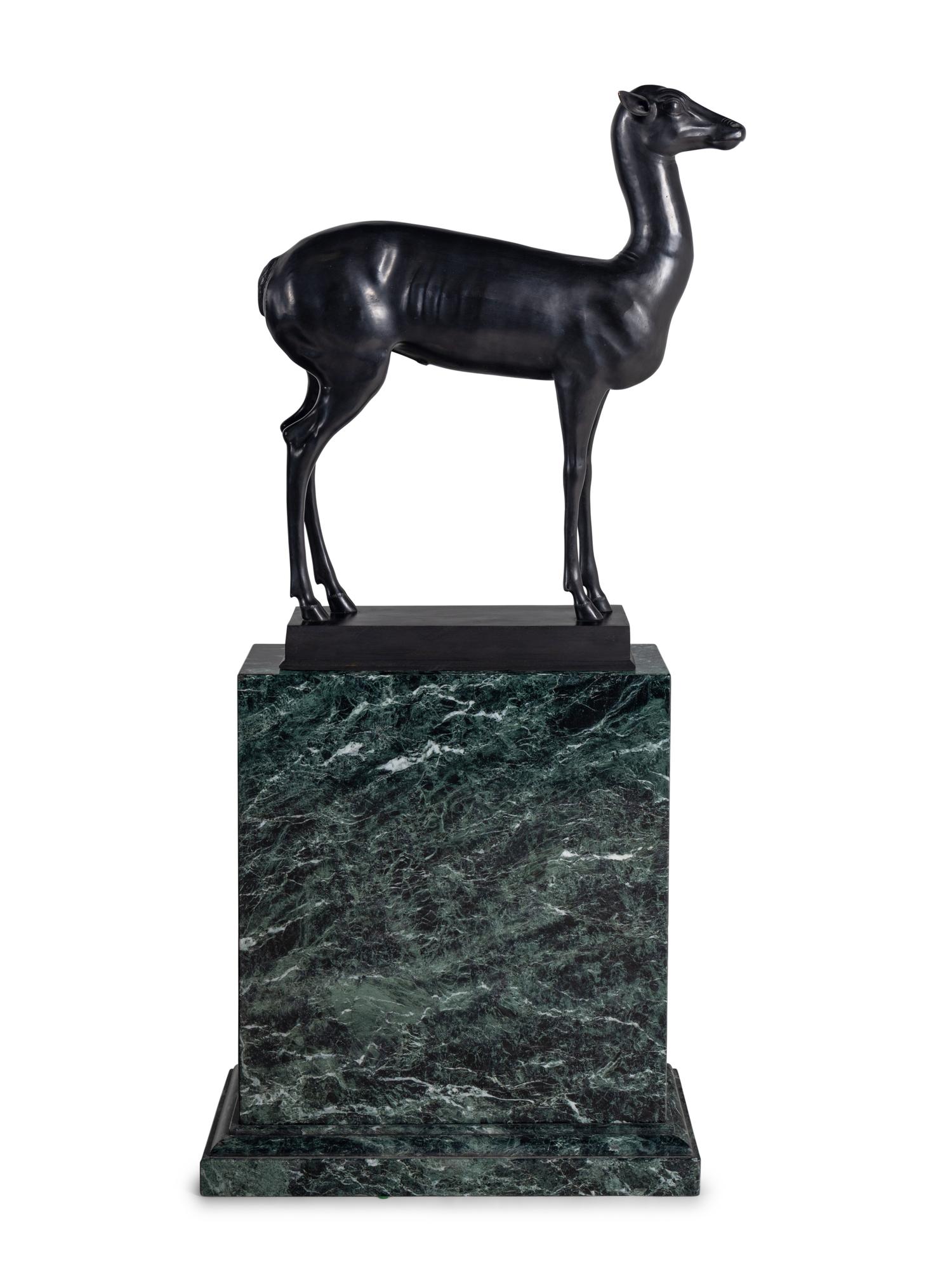 A Pair of Bronze Models of Pompeiian Deer on Marble Plinths