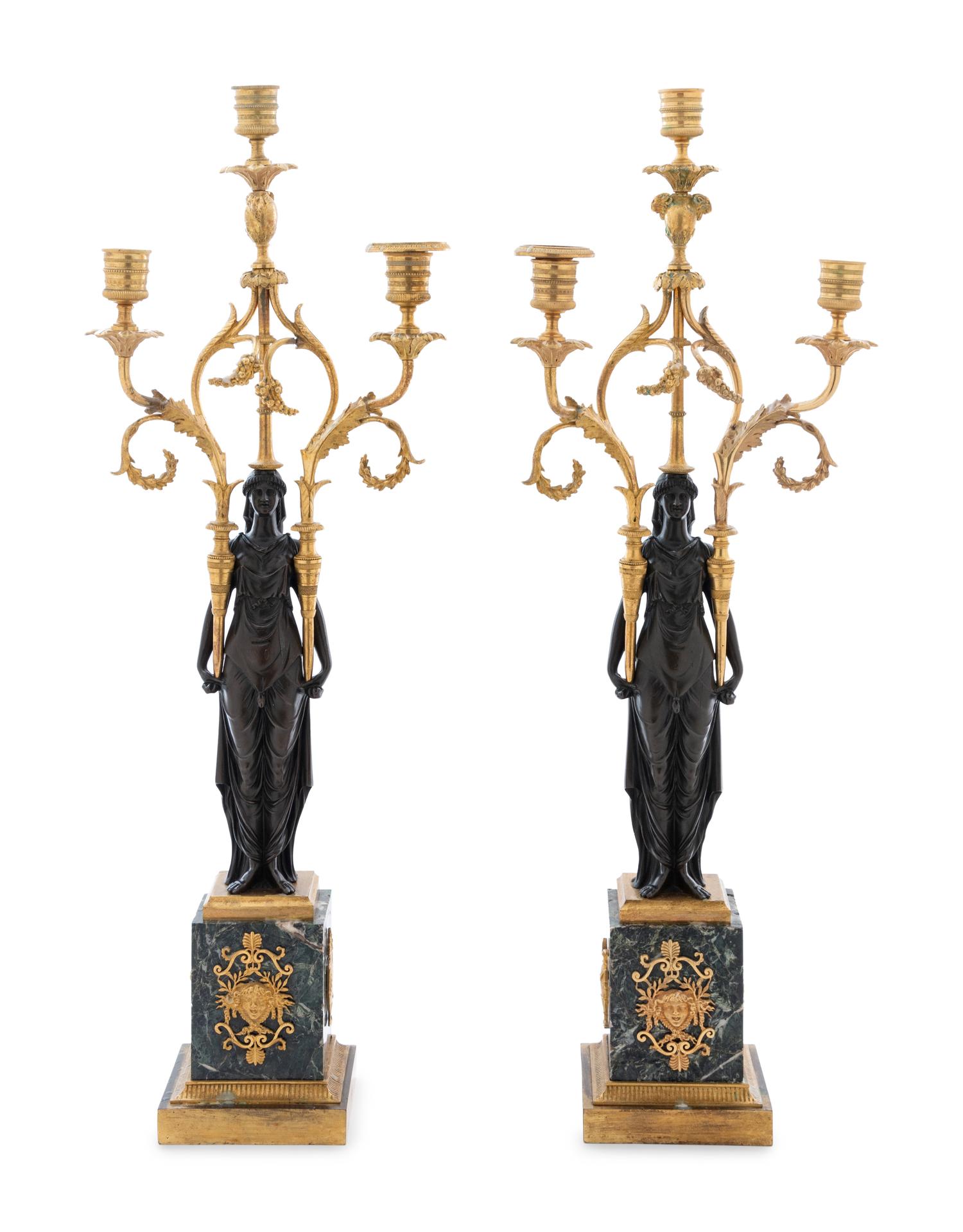 A Pair of Empire Gilt and Patinated Bronze and Marble Three-Light Figural Candelabra