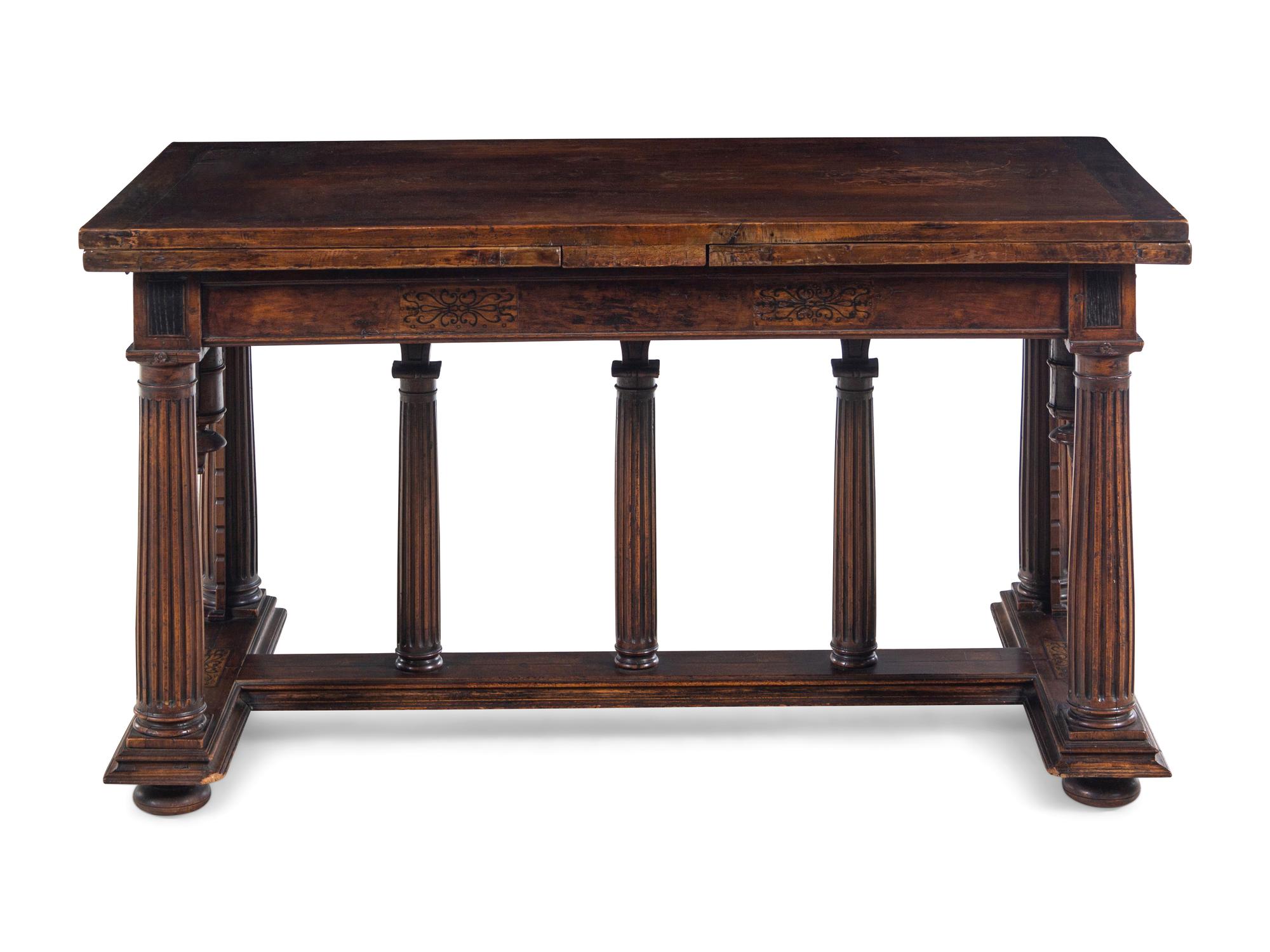 An Italian Walnut Extension Refectory Table