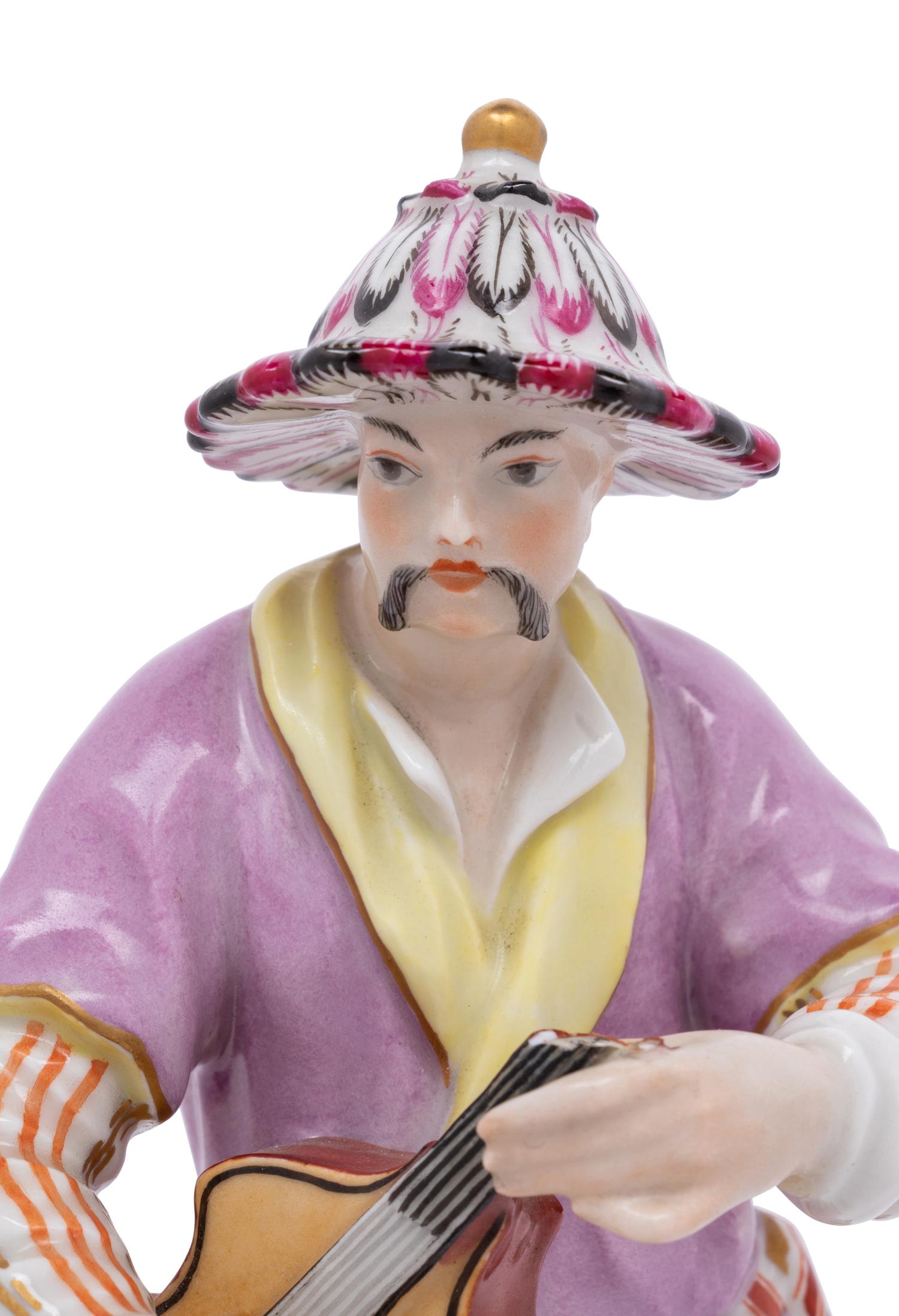 A Berlin (K.P.M.) Porcelain Figure of a Chinese Musician
