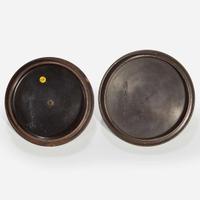 Two Japanese iron tetsubin with patinated bronze covers