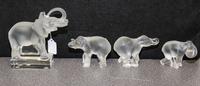 A Collection of Four Lalique Glass Elephant Figures Height of tallest 6 inches.