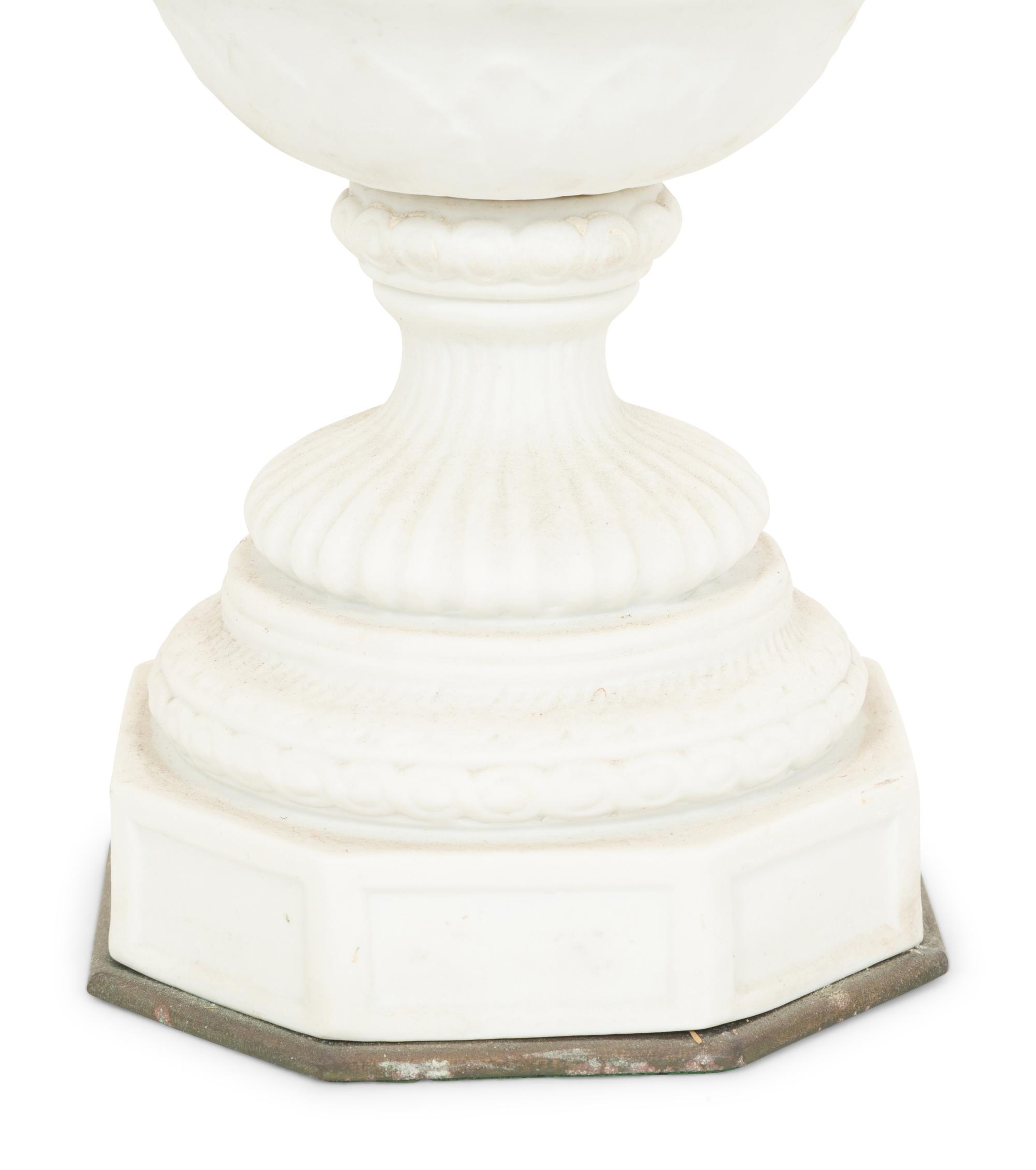 A Pair of Gilt Metal Mounted Bisque Porcelain Urns