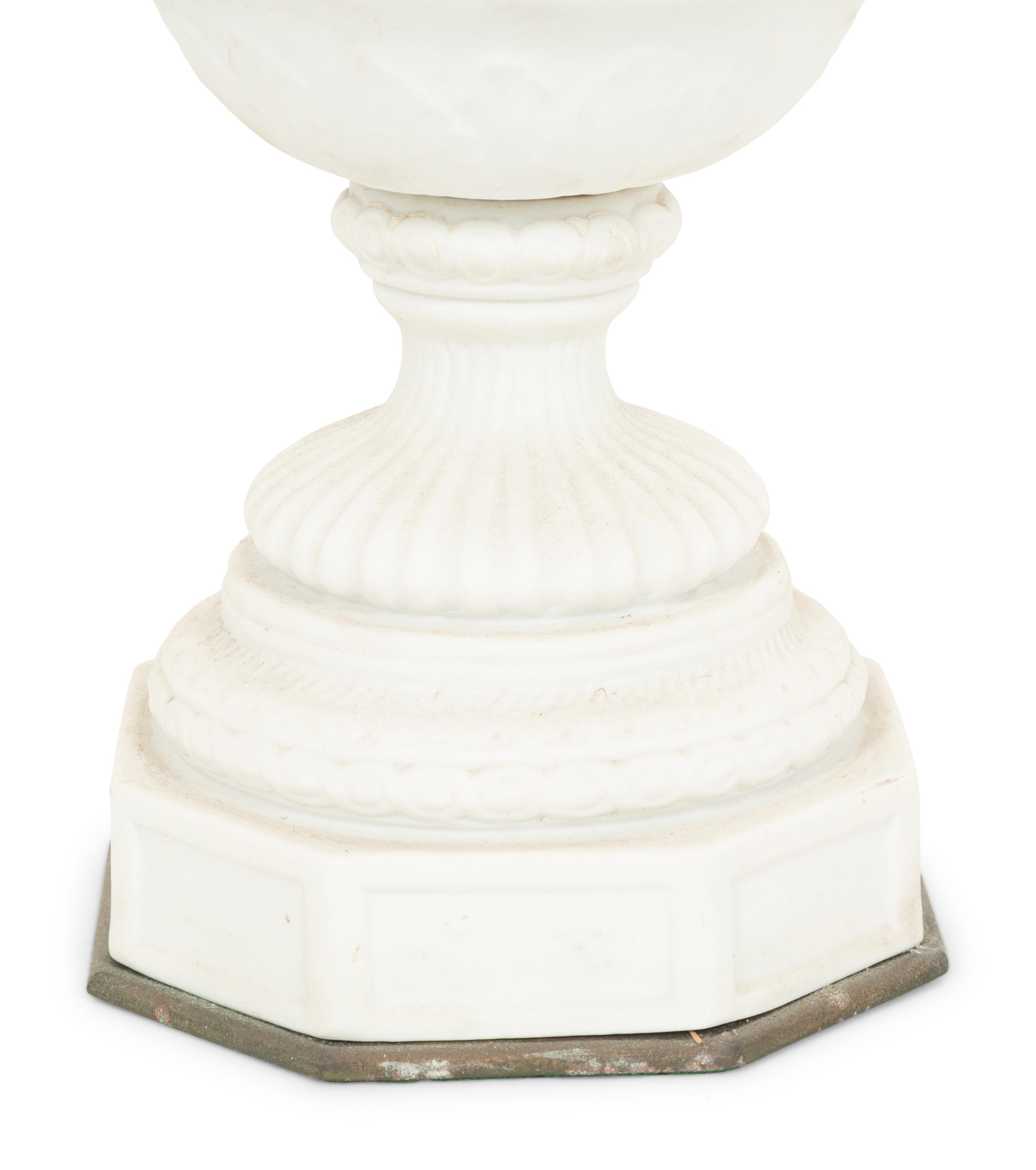 A Pair of Gilt Metal Mounted Bisque Porcelain Urns