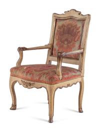 A Set of Four Italian Cream-Painted and Parcel Gilt Armchairs