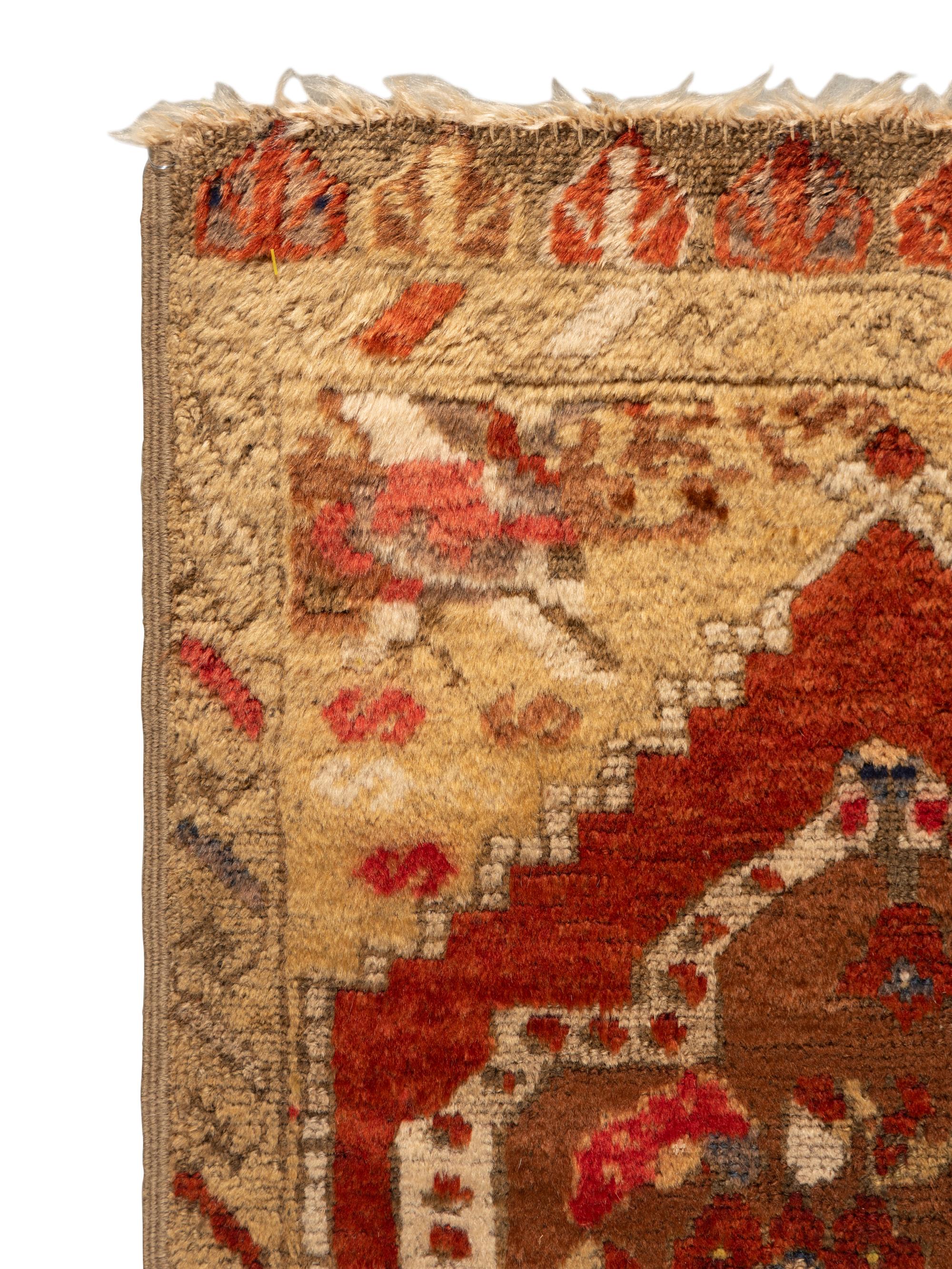 A Group of Three Small Rugs