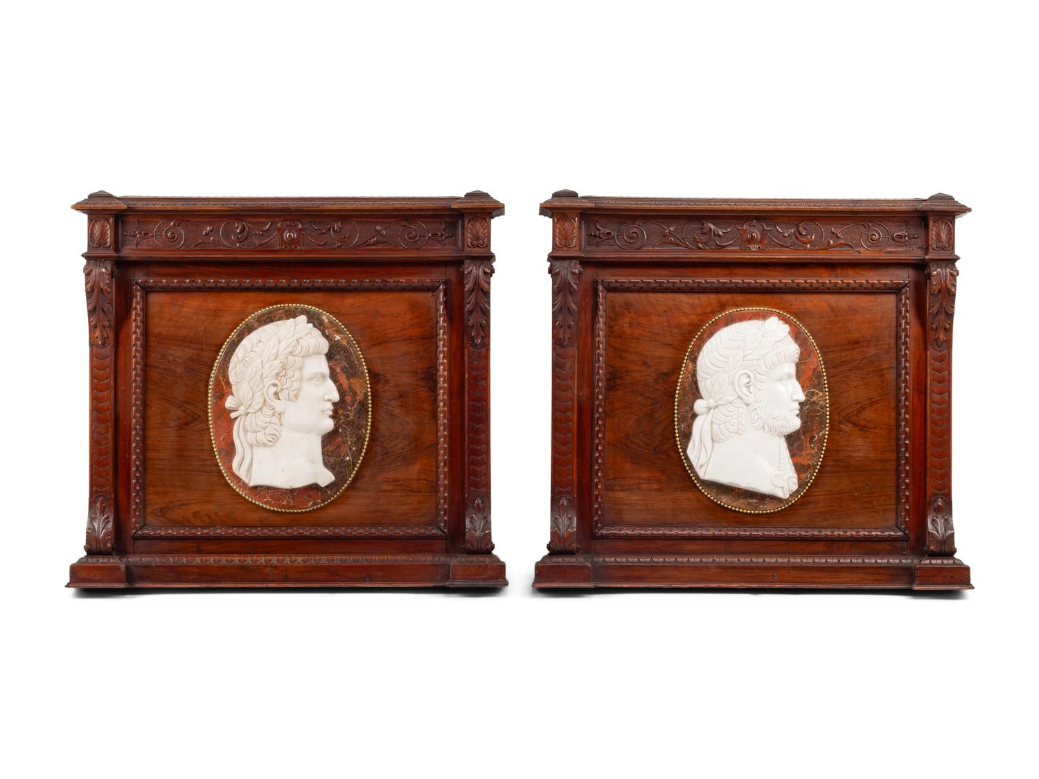 A Pair of Italian Carved Walnut Panels with Marble Profile Plaques