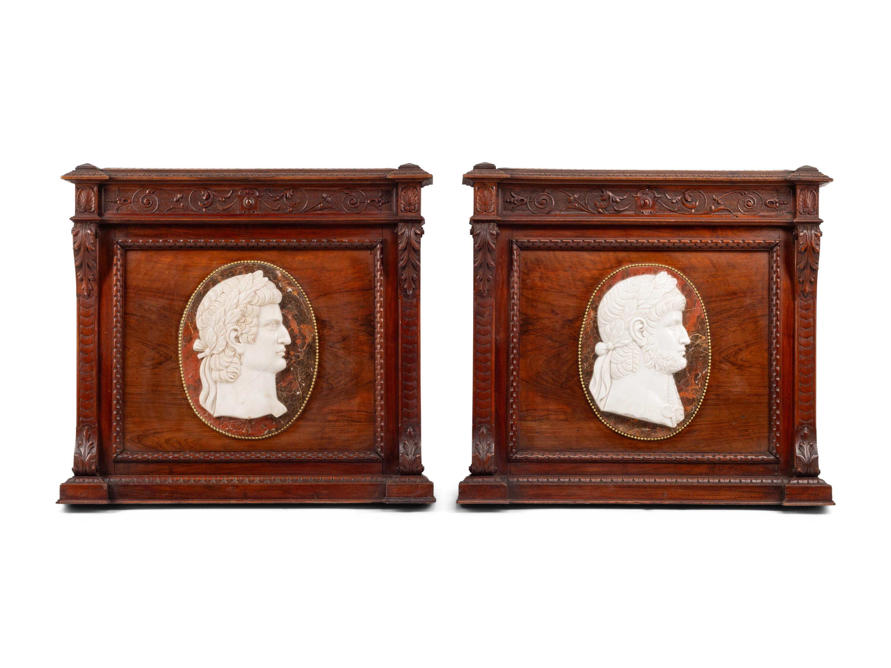 A Pair of Italian Carved Walnut Panels with Marble Profile Plaques