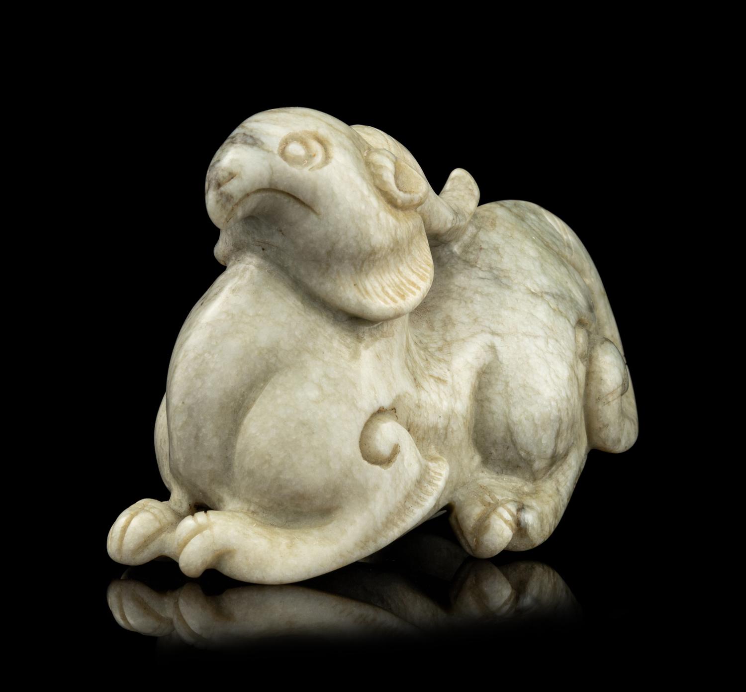 A Chinese Chicken Bone Jade Mythical Beast