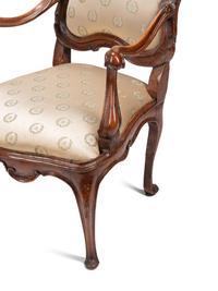 A Pair of Venetian Carved Walnut Armchairs