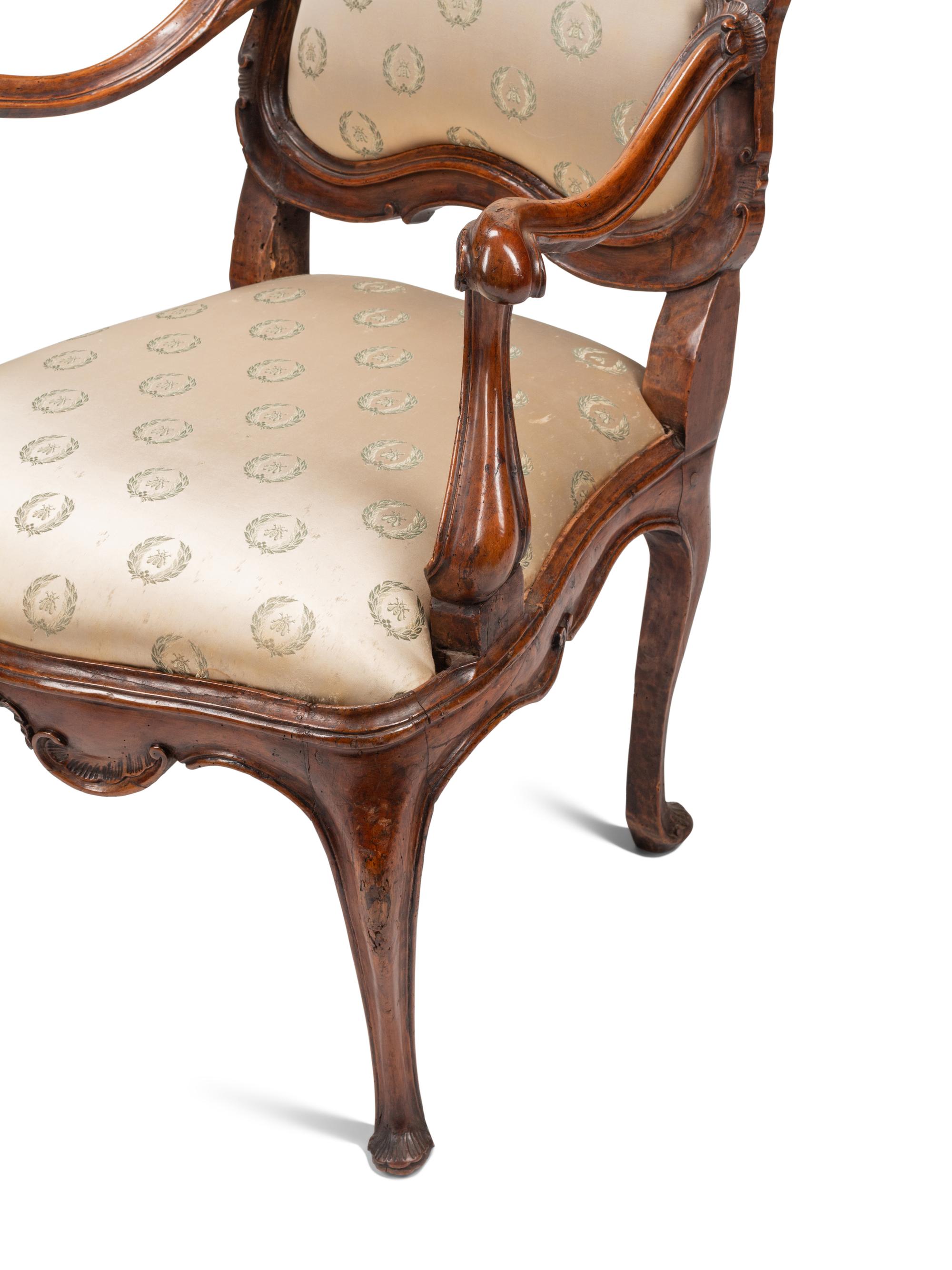 A Pair of Venetian Carved Walnut Armchairs