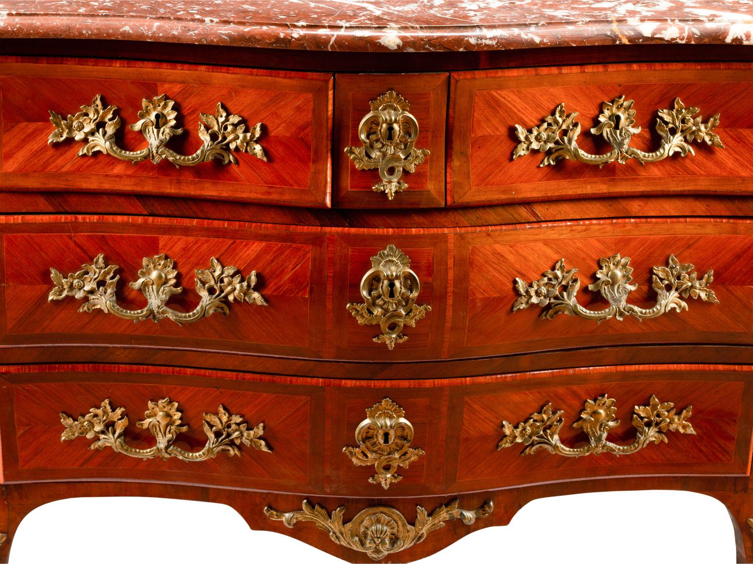 A Régence Style Gilt Bronze Mounted Kingwood Marble-Top Commode