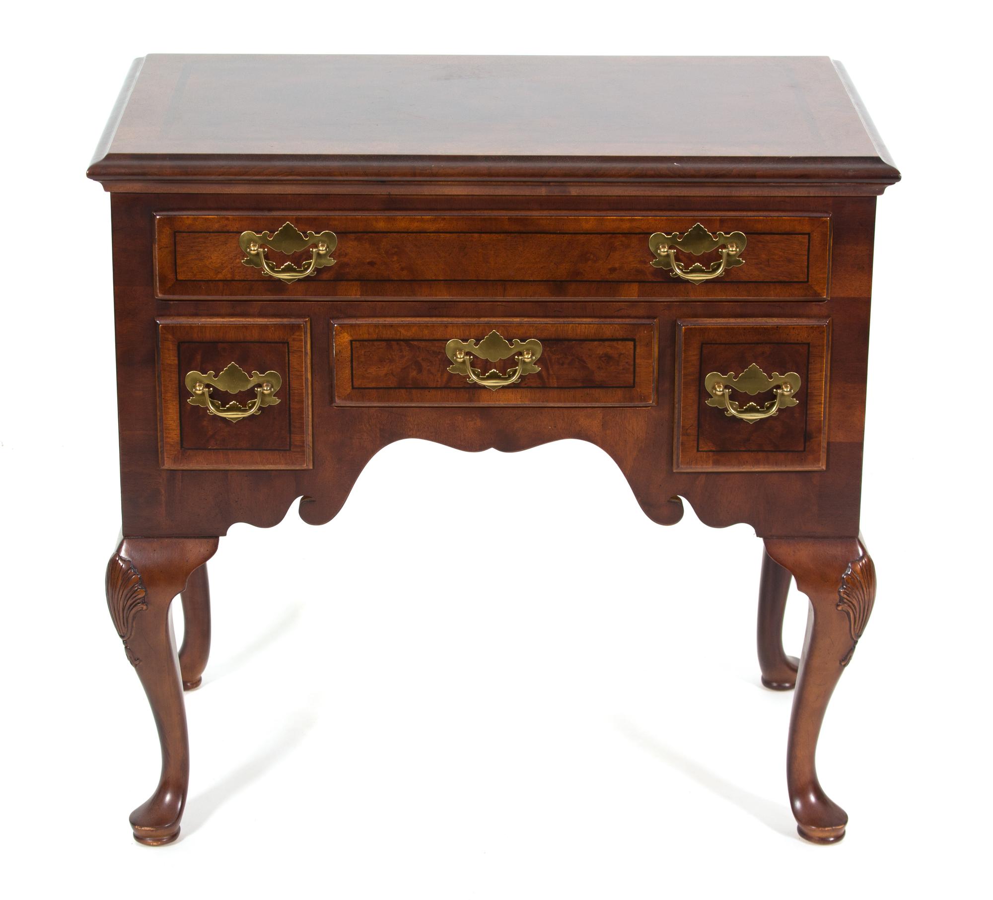 A Queen Anne Style Inlaid Mahogany Lowboy Height 28 1/2 x width 29 1/2 x depth 17 1/2 inches. — 20TH CENTURY
