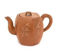 A Yixing Pottery Teapot Height 3 3/4 inches.
