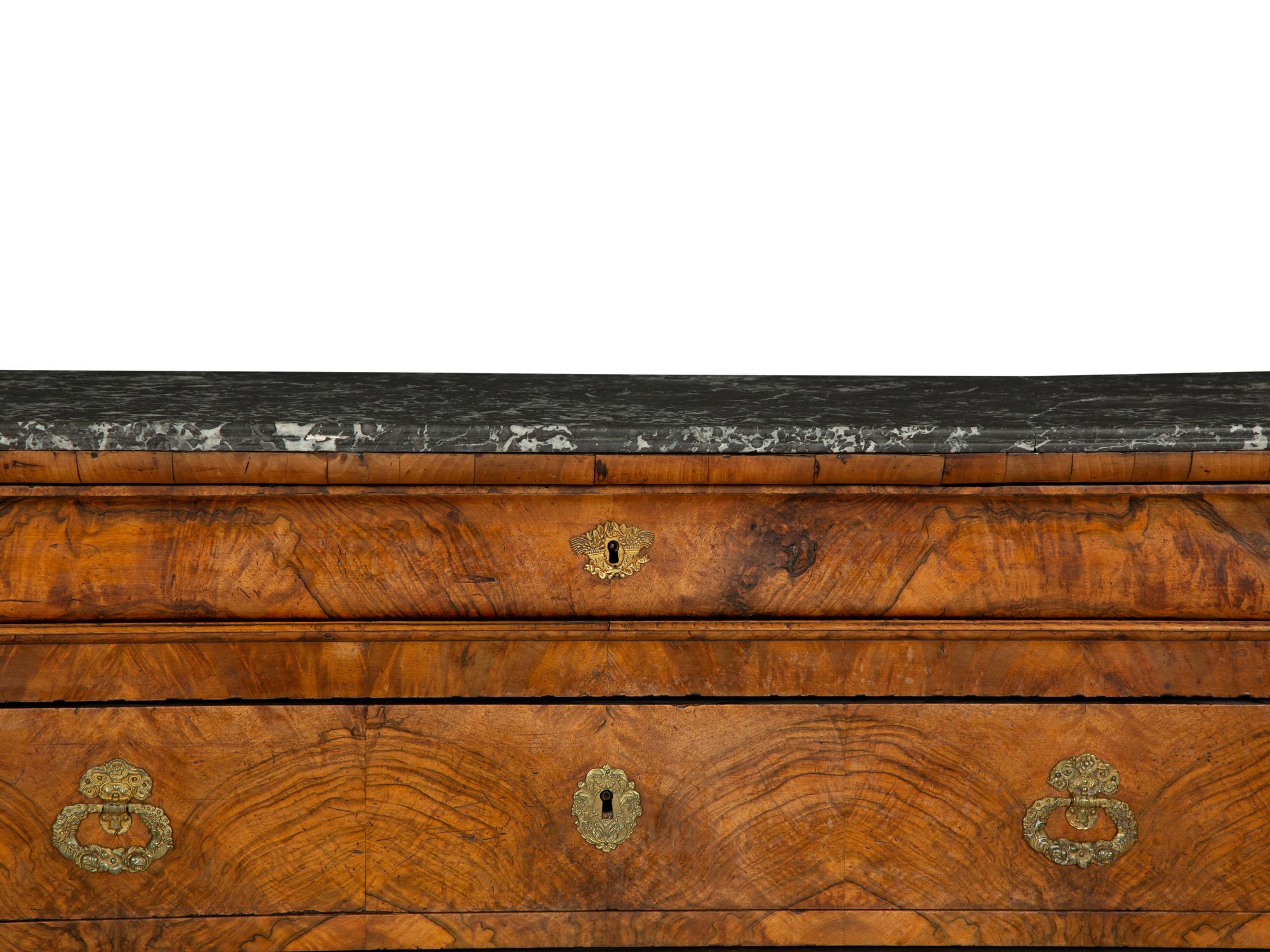 A Louis Philippe Burled Walnut Marble Top Commode
