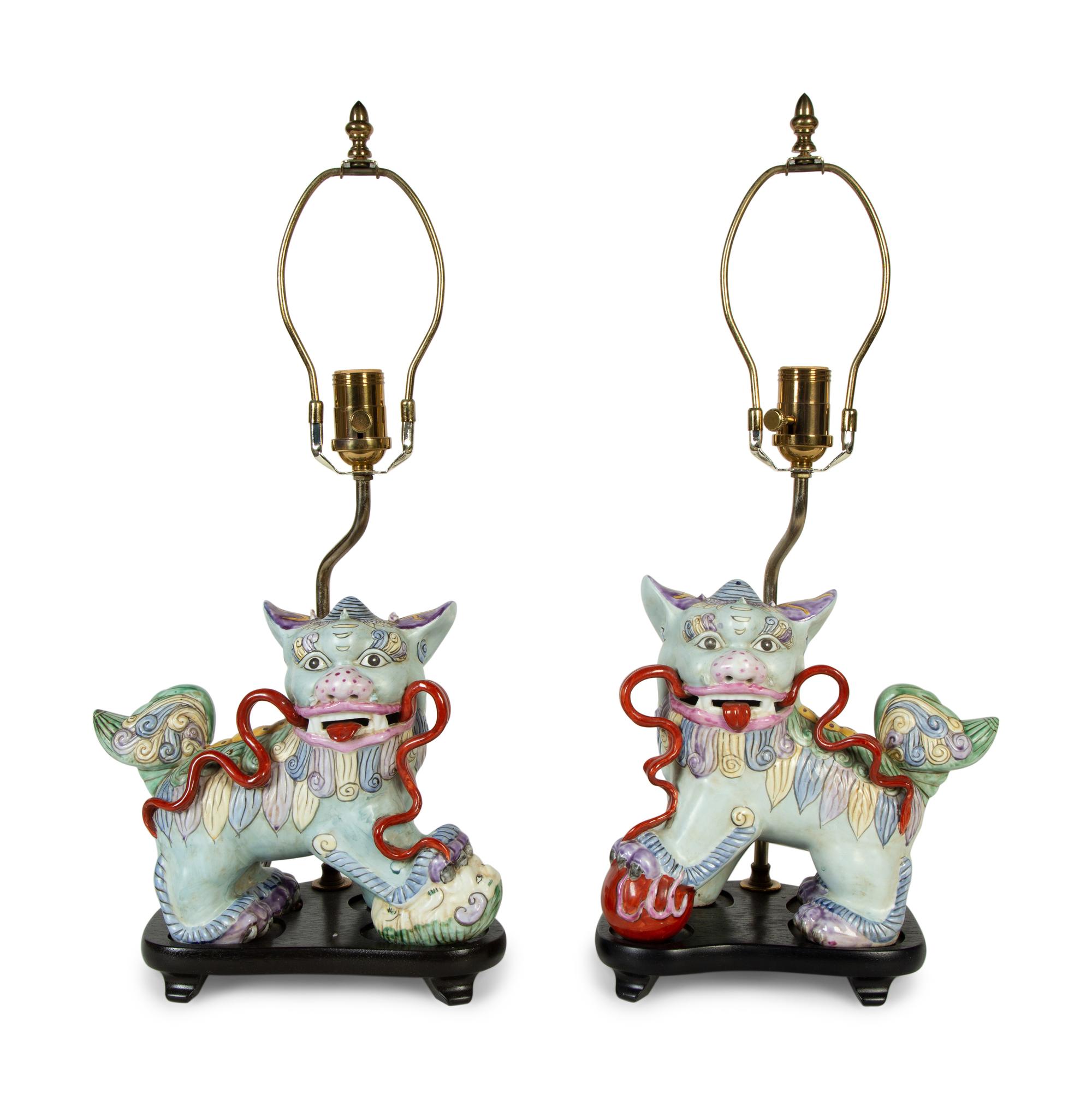 A Pair of Chinese Export Porcelain Buddhistic Lions Mounted as Lamps