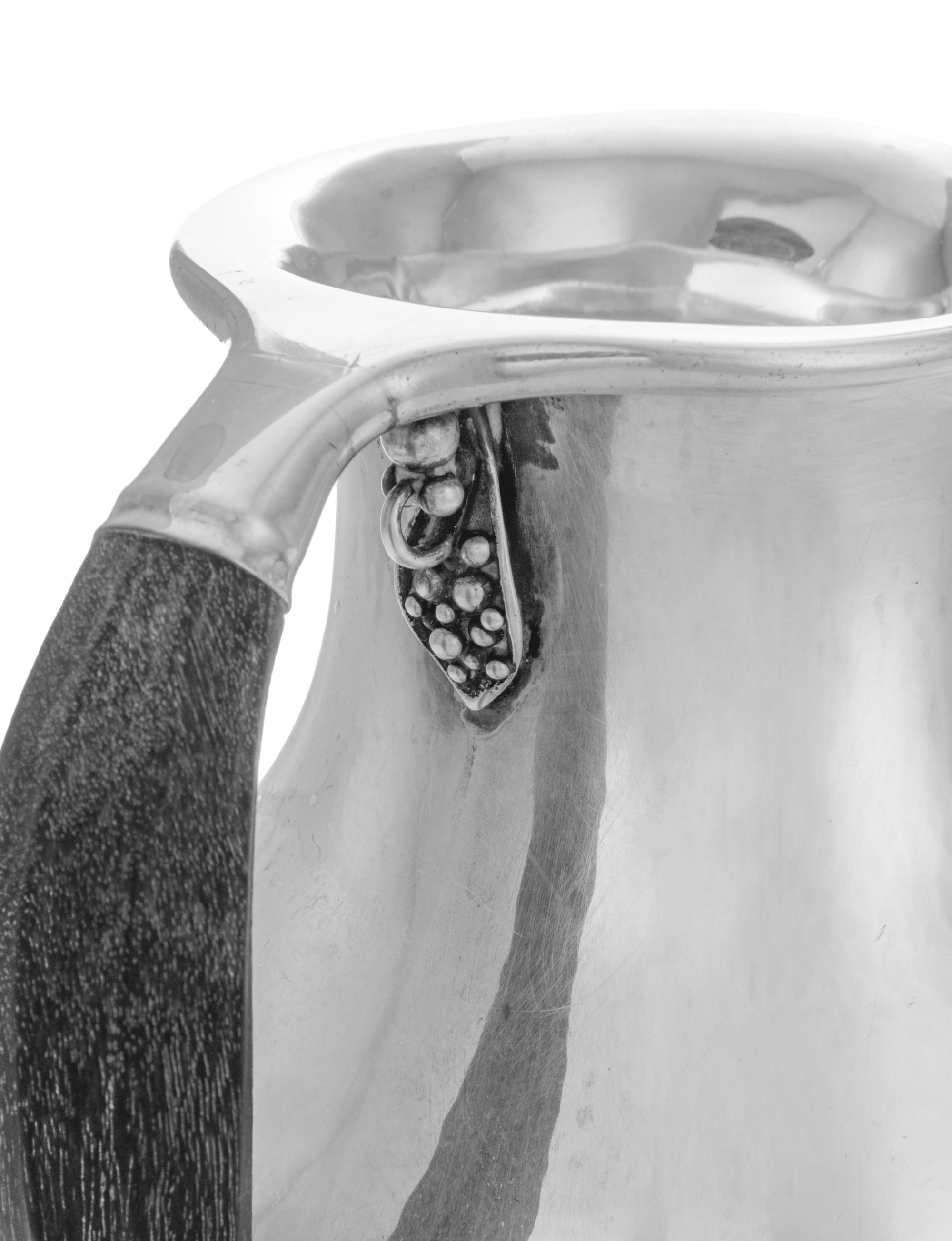 A Danish Silver Water Pitcher Item 87 on original listing.