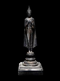 A South East Asian Silver Figure of a Standing Buddha