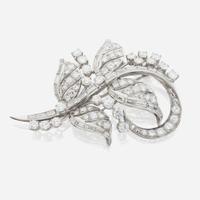 A diamond and platinum brooch