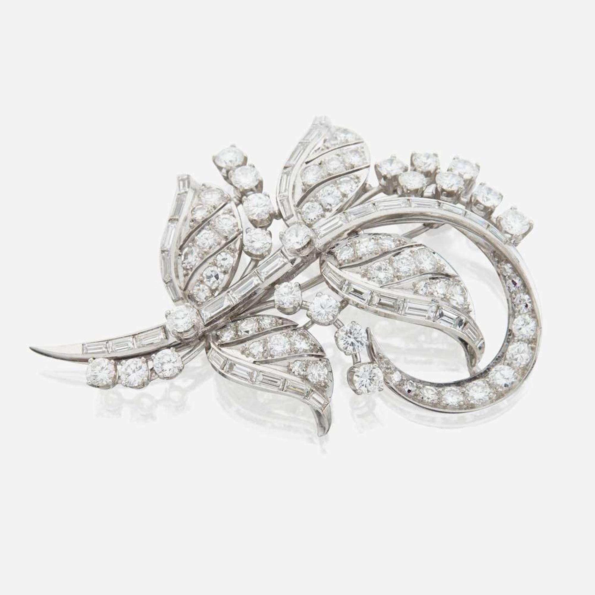 A diamond and platinum brooch