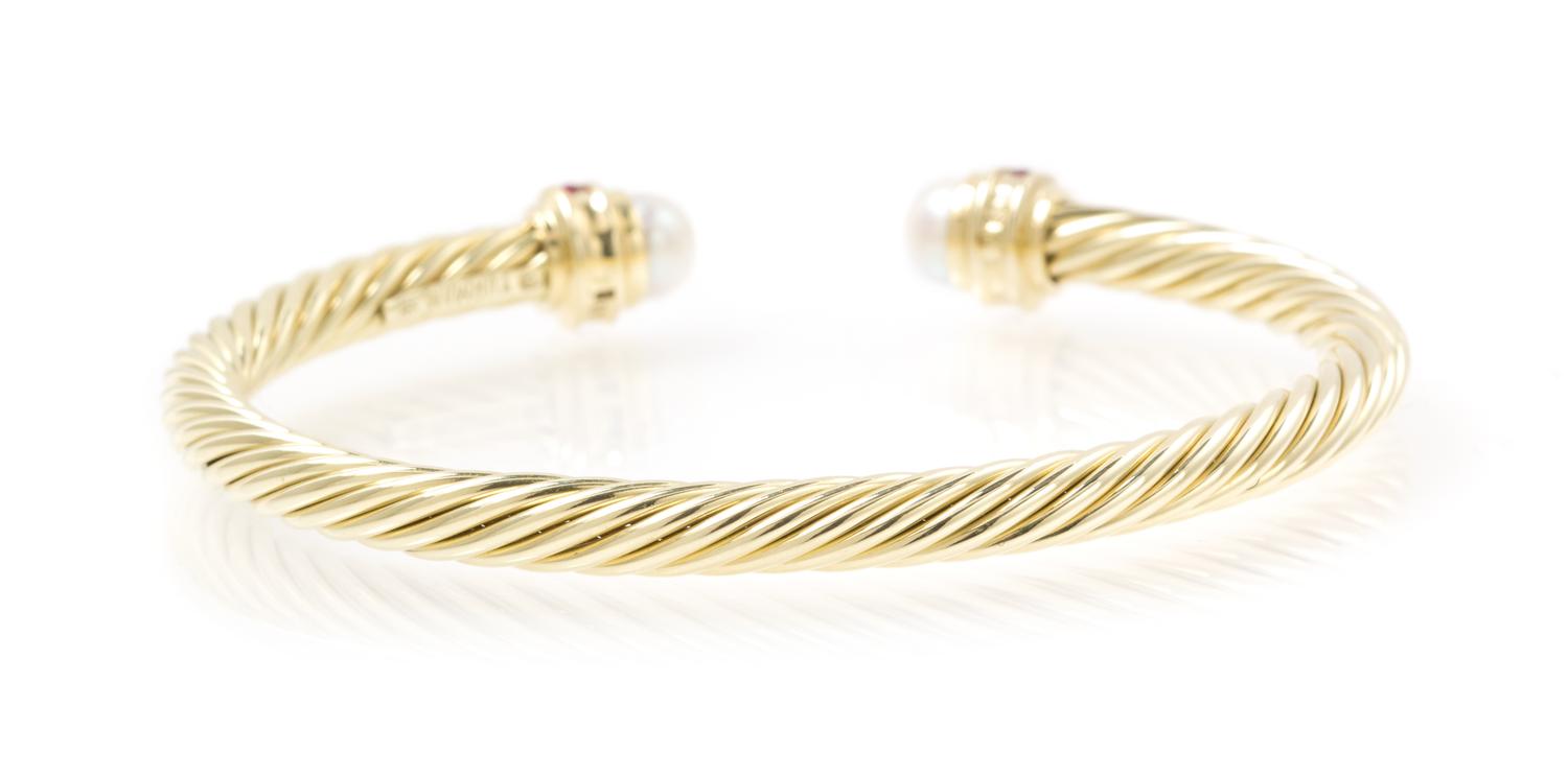 A 14 Karat Yellow Gold, Cultured Pearl and Ruby Cable Bangle Bracelet, David Yurman, 9.60 dwts.