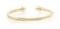 A 14 Karat Yellow Gold, Cultured Pearl and Ruby Cable Bangle Bracelet, David Yurman, 9.60 dwts.