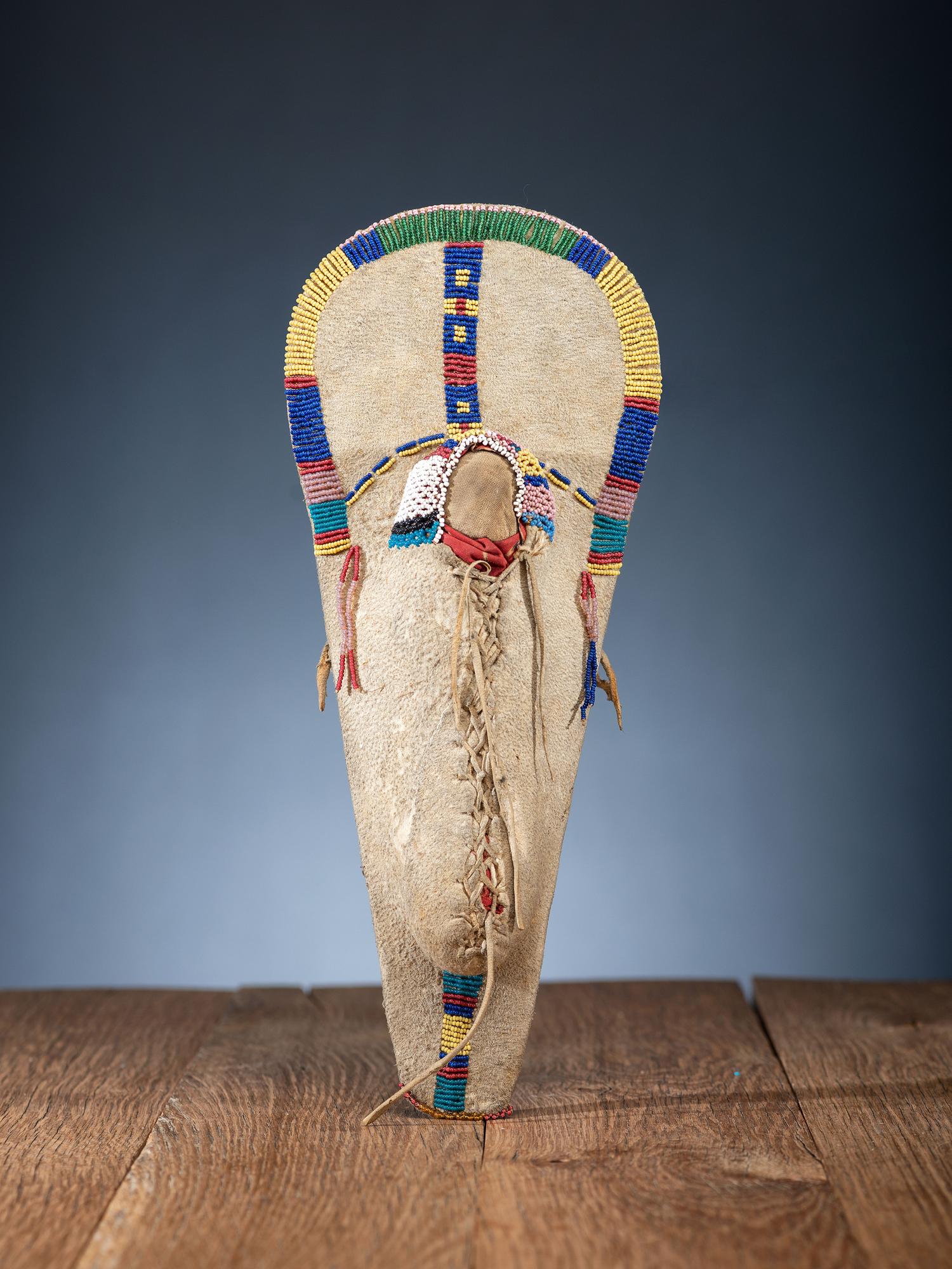 Bannock and Ute Beaded Hide Toy Cradles