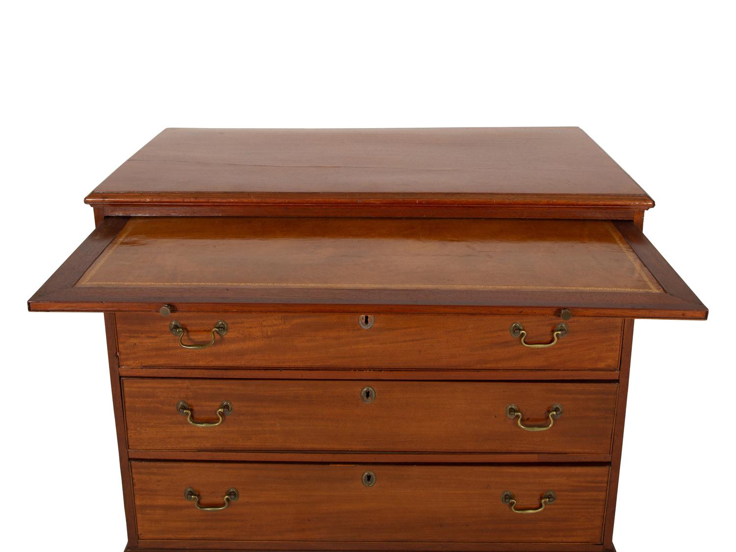 A George III Style Mahogany Bachelor's Chest with Pull-out Slide