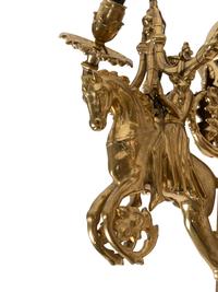 A Pair of Gothic Style Brass Three-Light Sconces