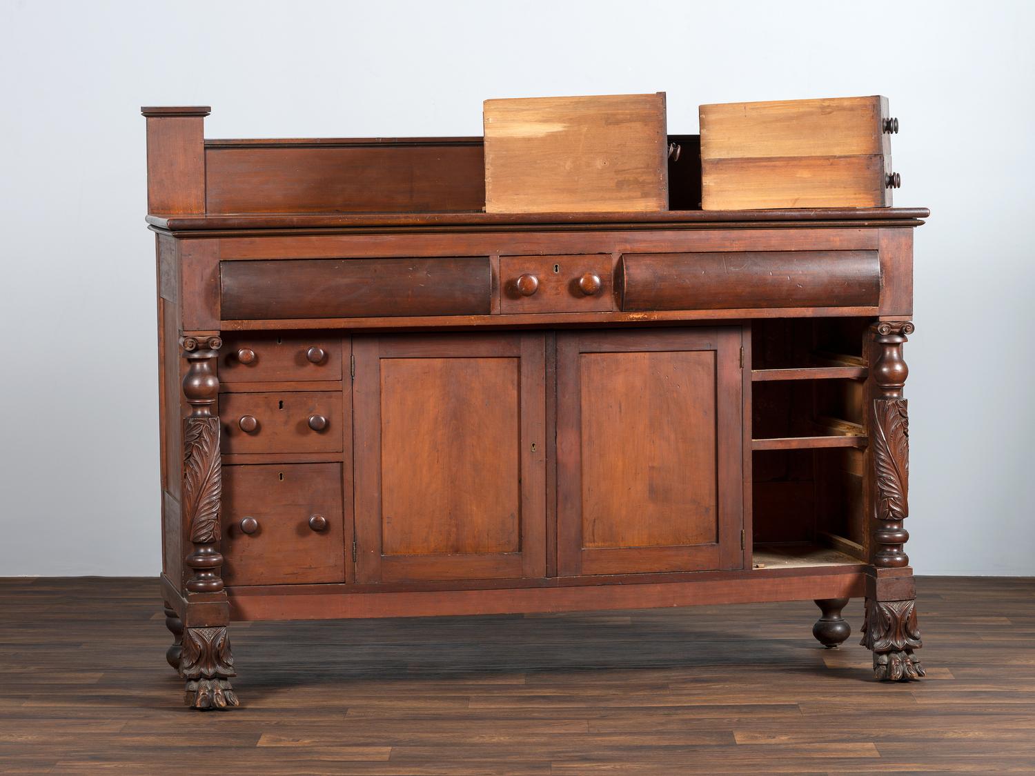 AWAITING DONATION - A Classical Carved and Stained Cherrywood Sideboard